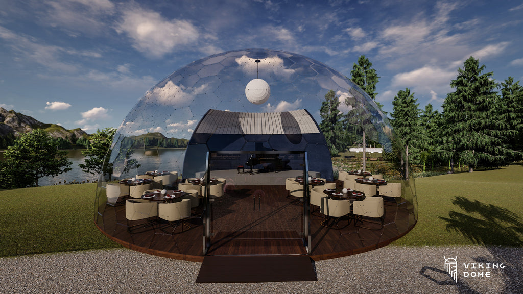 12m wide outdoor Perspex dome with double glass door entrance into a dining dome with Piano on a stage in the background 