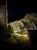 Outdoor 3.6m dining domes with strings of p-lights at the base set up at the Fowey Hotel, Fowey, Cornwall
