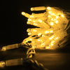 Warm white fairy lights create instant ambiance in an Aura Dome perspex garden room, garden pod, garden igloo